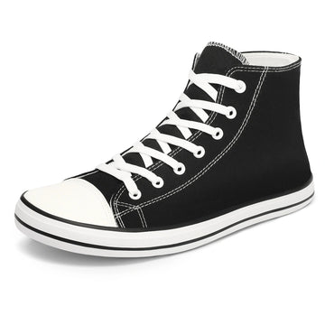 Zapatilla minimalista negra de lona estilo clásico, suela plana.