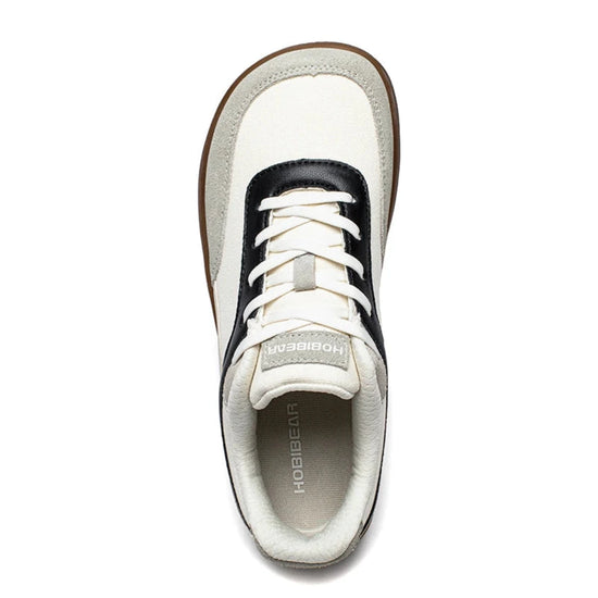 Vista superior de calzado barefoot resaltando su horma anatómica que respeta el espacio de los dedos.