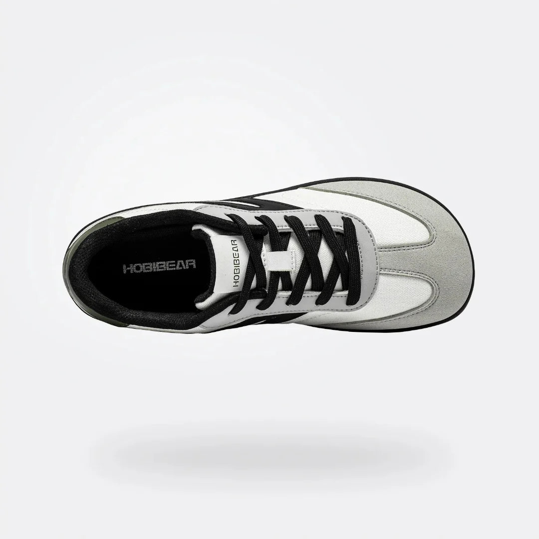 Vista superior de calzado barefoot de transición resaltando el amplio espacio para los dedos.