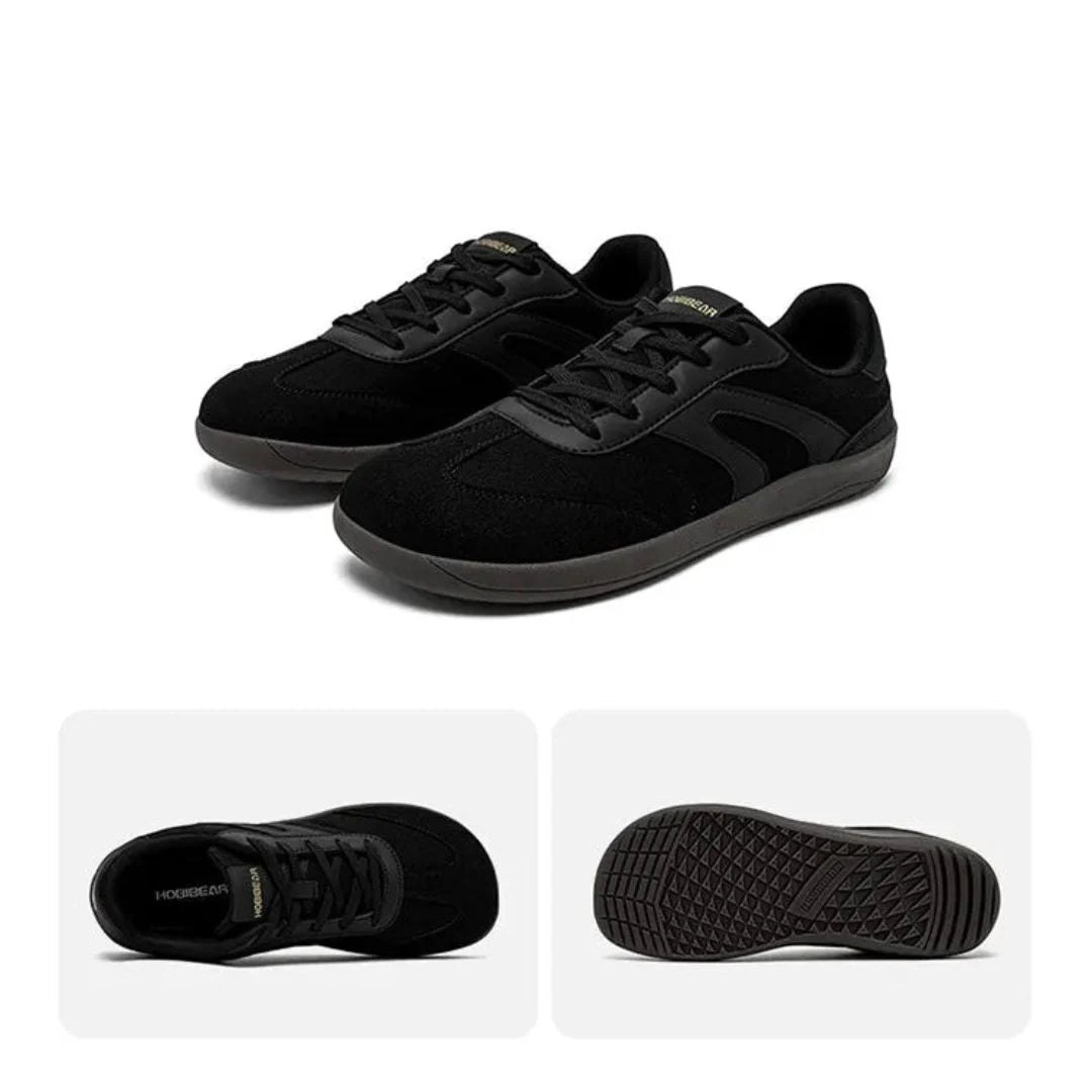 Vistas del calzado barefoot negro resaltando el amplio espacio para los dedos.