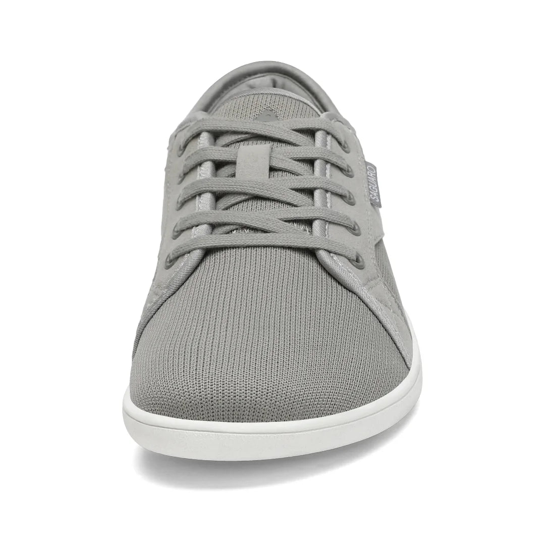 Zapatilla barefoot urbana frontal gris, suela delgada zero drop.