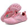 Par de zapatillas barefoot Saguaro Kids rosa mostrando suela flexible zero drop.
