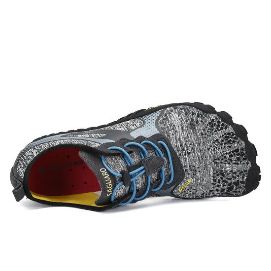 Zapatilla Saguaro Fast I gris vista interna y superior mostrando materiales y refuerzos.