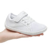 Zapatilla minimalista blanca infantil, flexible, ligera y cómoda.