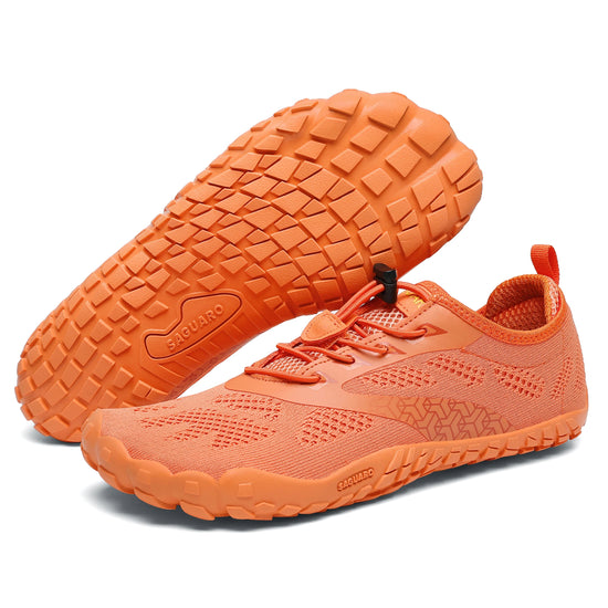 Par de zapatillas Smart I naranja vistas juntas.