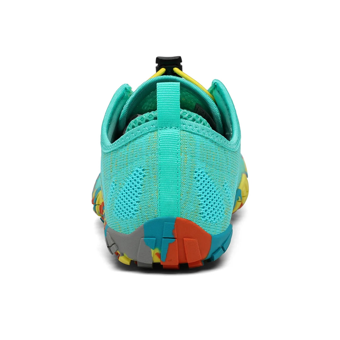 Zapatilla Smart II turquesa vista trasera con talón estable.