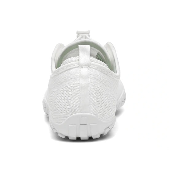 Smart I blancas vista trasera mostrando talón firme y acolchado.