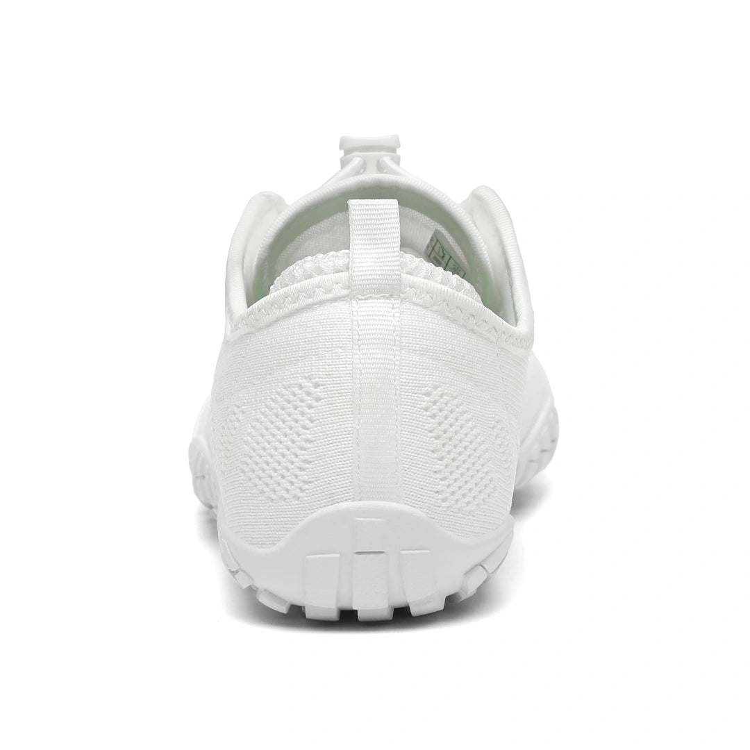 Smart I blancas vista trasera mostrando talón firme y acolchado.