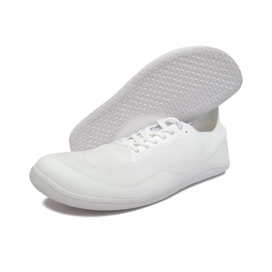 Suela flexible de Sowilo Kenaz blanca vista inferior con patrón adherente.