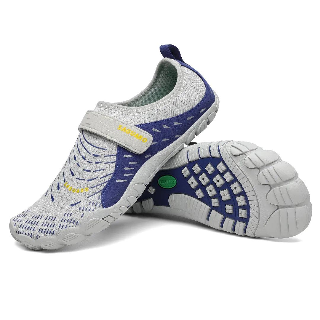 Suela negra con orificios de drenaje y agarre para superficies mojadas.