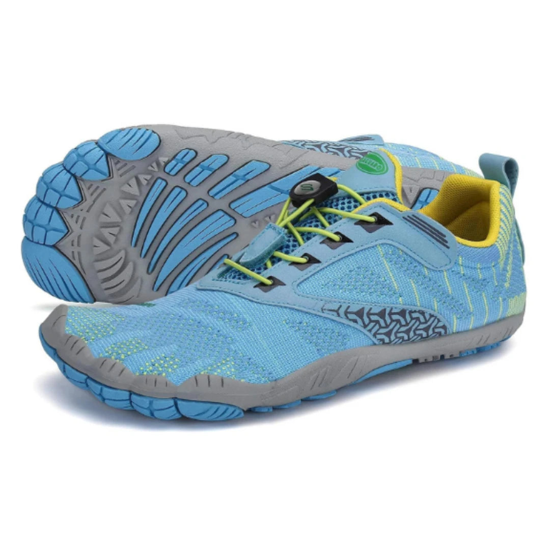 Suela azul/gris que favorece la técnica de carrera natural.