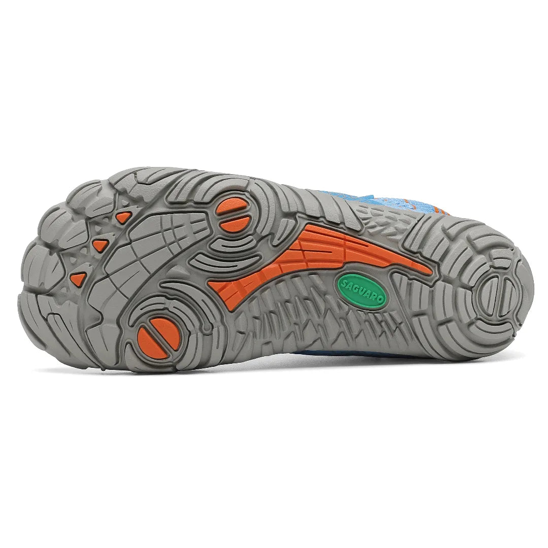 Suela de goma gris y naranja zero drop de zapatilla Saguaro infantil.