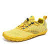 Zapatilla barefoot deportiva amarilla Saguaro Free I, suela plana y flexible.