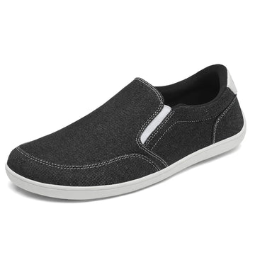 Zapatilla casual sin cordones negra, estilo alpargata minimalista.