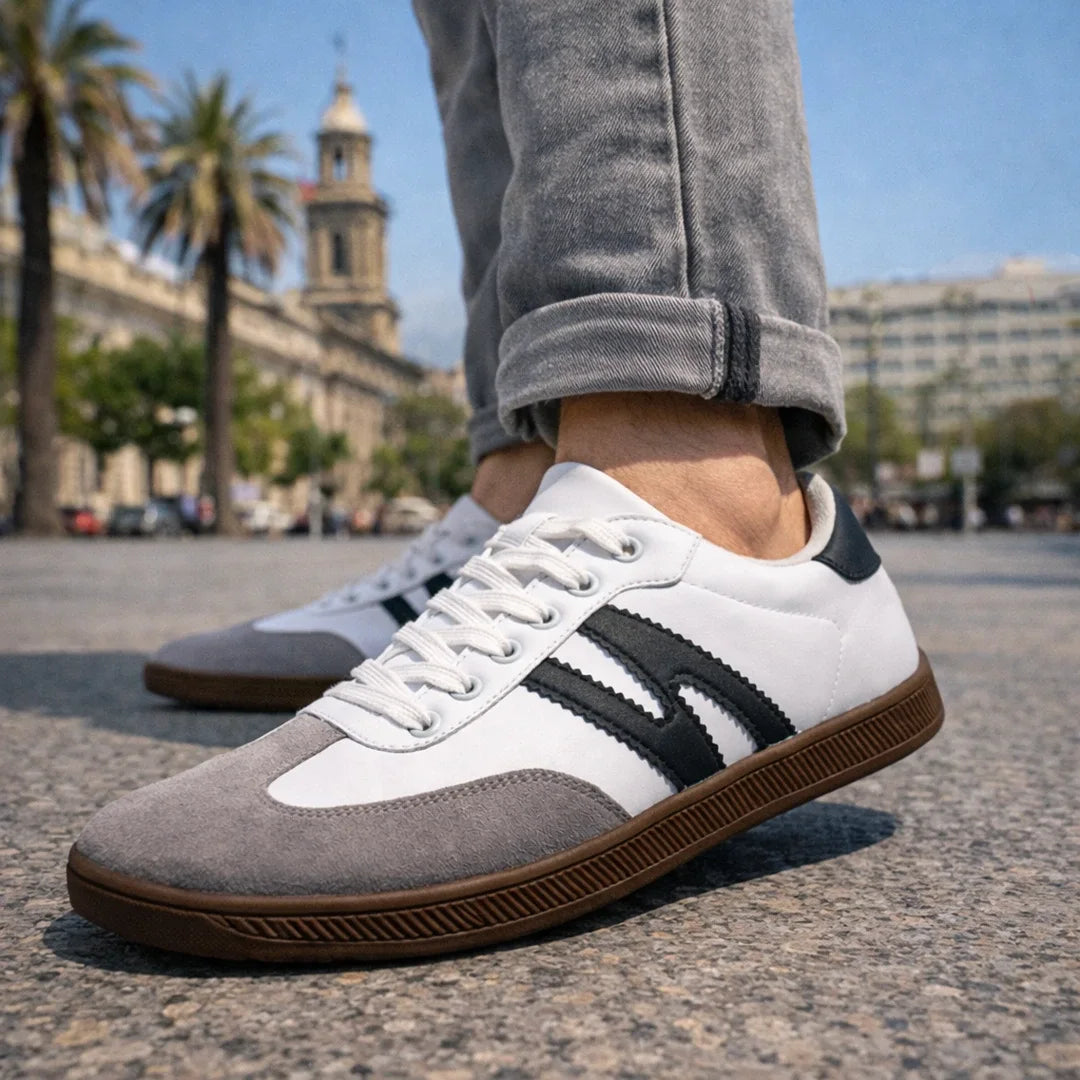 Zapatillas barefoot hombre modelo Niza I 2.0 blancas con diseño retro y suela café.