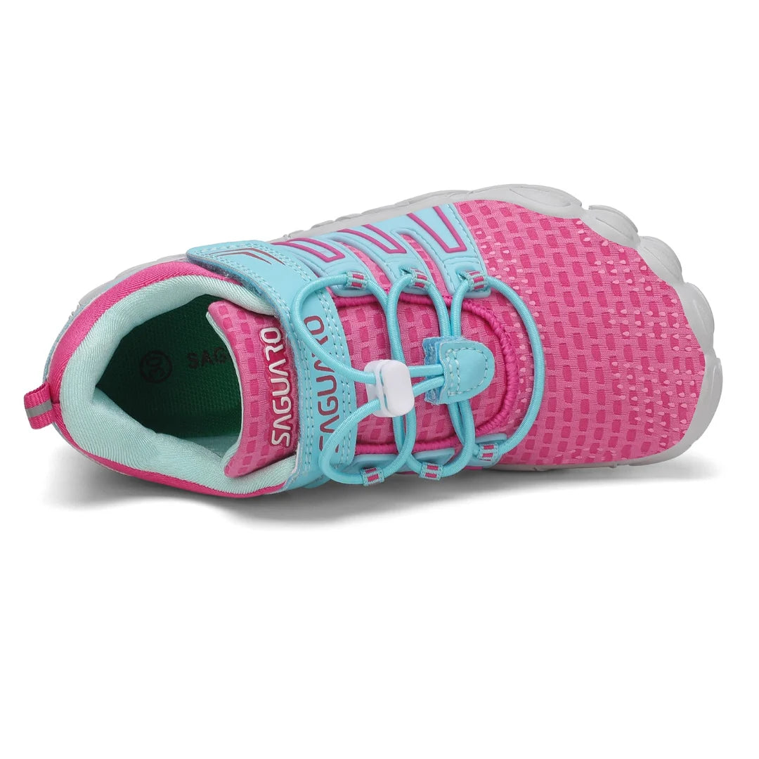 Vista superior de zapatillas barefoot rosa destacando la plantilla ergonómica y horma ancha.