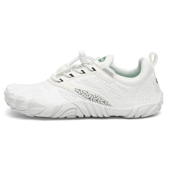 Zapatillas barefoot blancas vista lateral externa