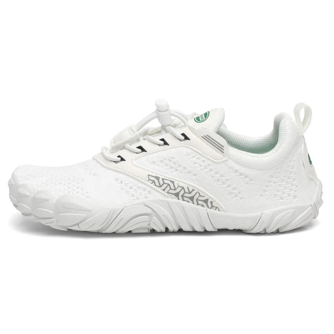 Zapatillas barefoot blancas vista lateral externa