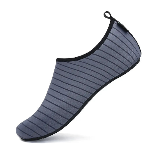 Zapatillas de agua barefoot grises Saguaro Touch IV, calzado anfibio de secado rápido para playa y deportes náuticos.