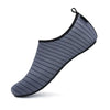 Zapatillas de agua barefoot grises Saguaro Touch IV, calzado anfibio de secado rápido para playa y deportes náuticos.