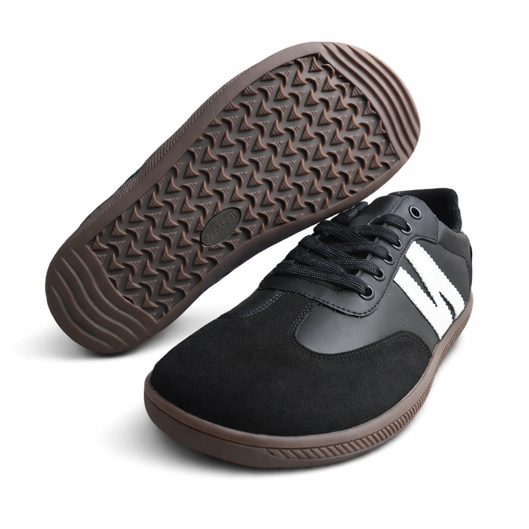 Par de zapatos minimalistas con suela de caucho flexible y antideslizante.