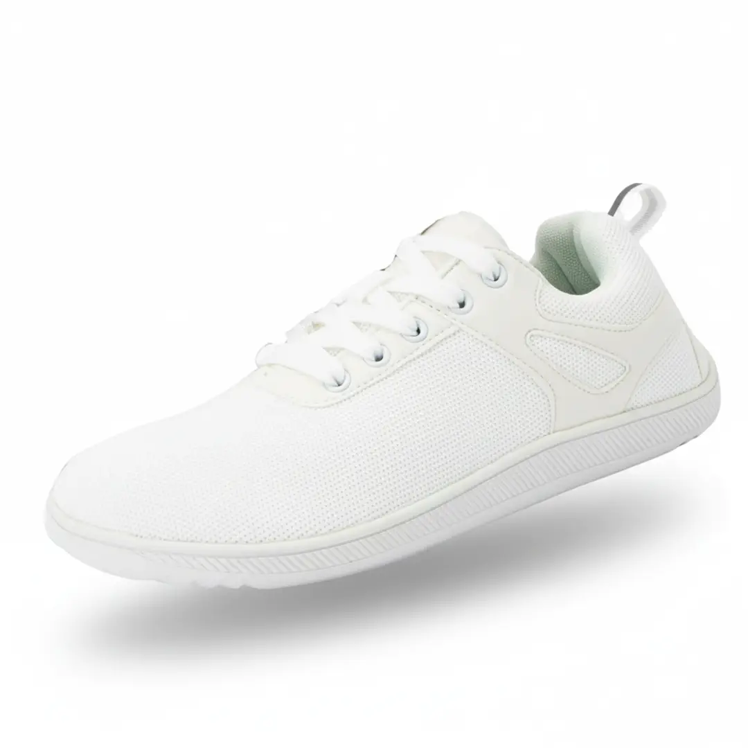 Zapatilla barefoot ZZfaber Comfy I blanca vista diagonal.