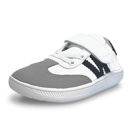 Zapatilla barefoot infantil ZZfaber Kids Niza I blanco con negro vista diagonal.
