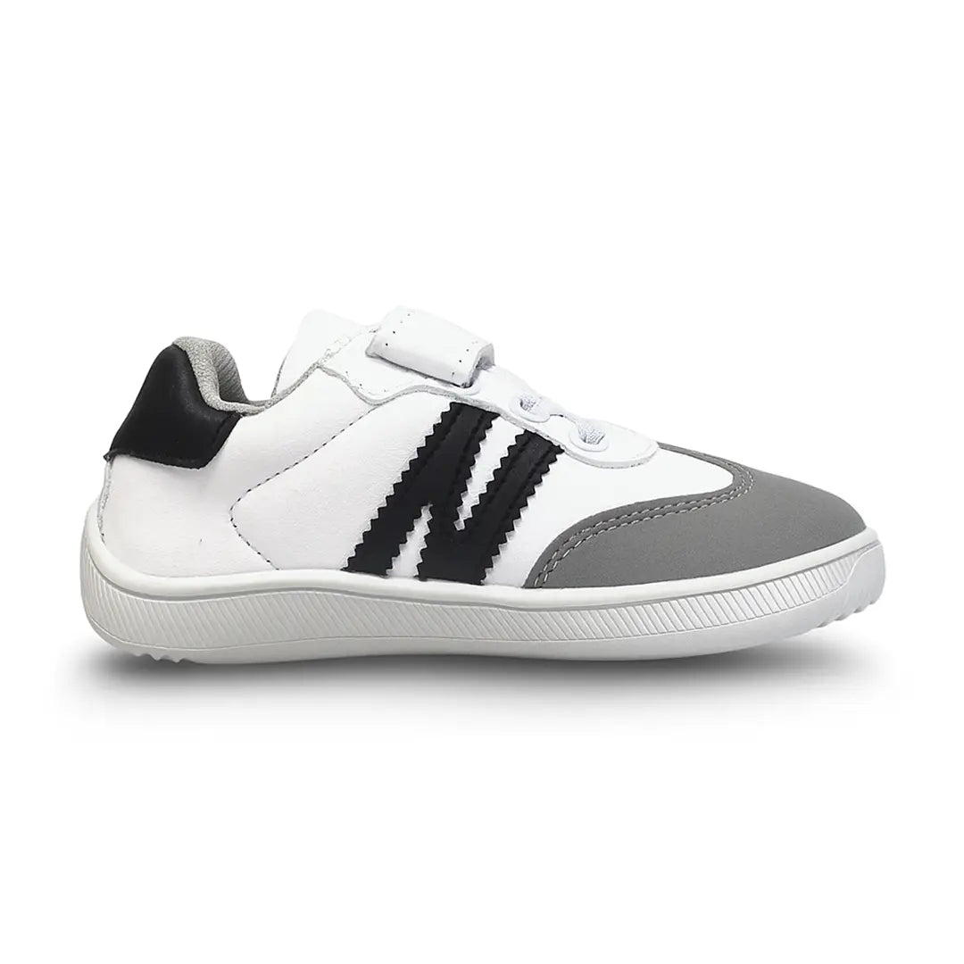 Zapatilla barefoot infantil ZZfaber Kids Niza I blanco con negro vista lateral.