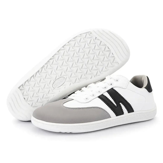 Suela flexible y antideslizante de la zapatilla barefoot ZZfaber Niza I blanco con negro.