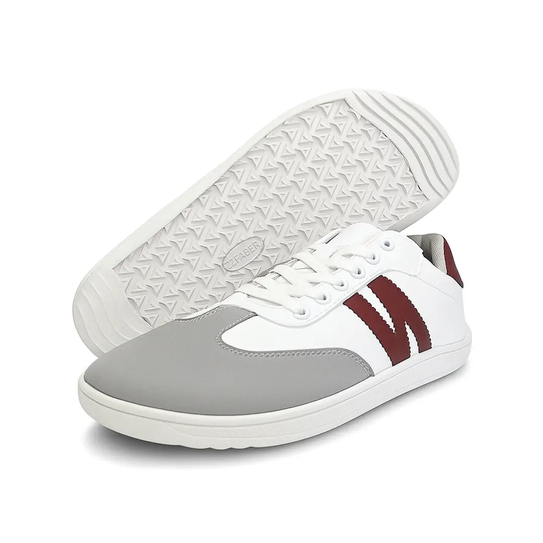 Suela flexible y antideslizante de la zapatilla barefoot ZZfaber Niza I blanco con vinotinto.