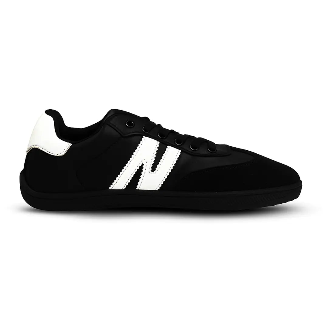 Zapatilla barefoot ZZfaber Niza I negra con blanco vista lateral.